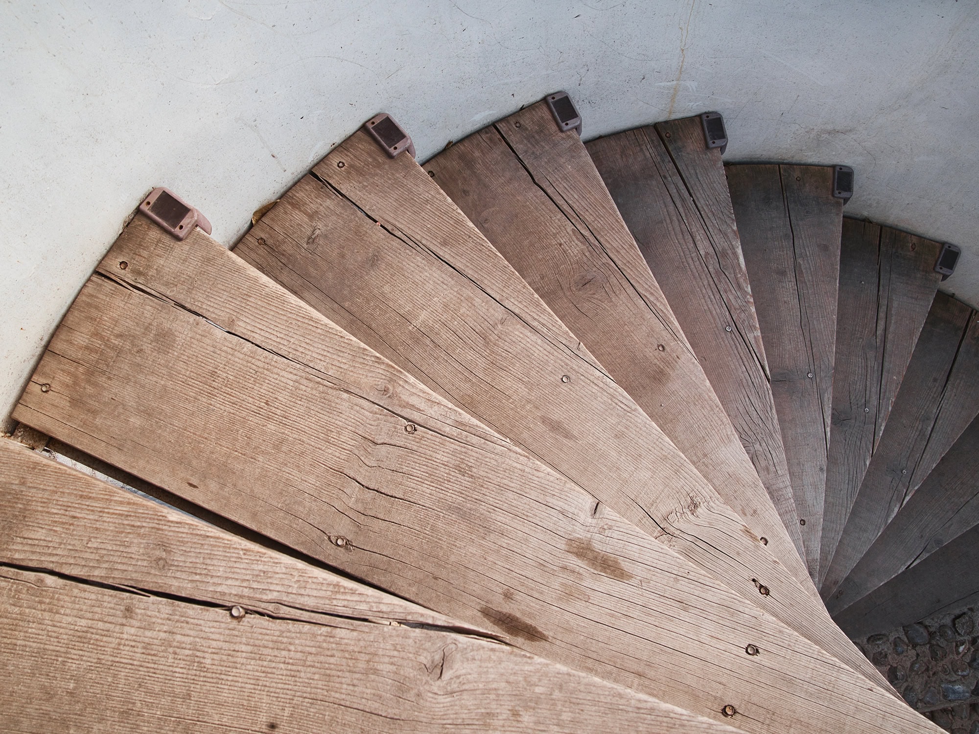 Wooden spiral staircase in Baisha Ancient Town