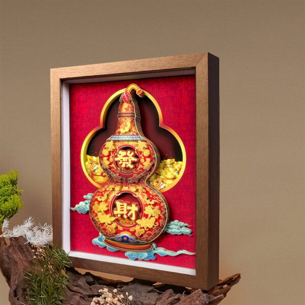 3D paper artwork of a fortune gourd displayed on a wooden stand