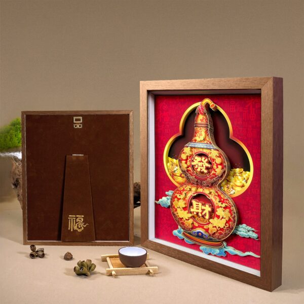 Traditional gourd artwork displayed with tea ceremony items