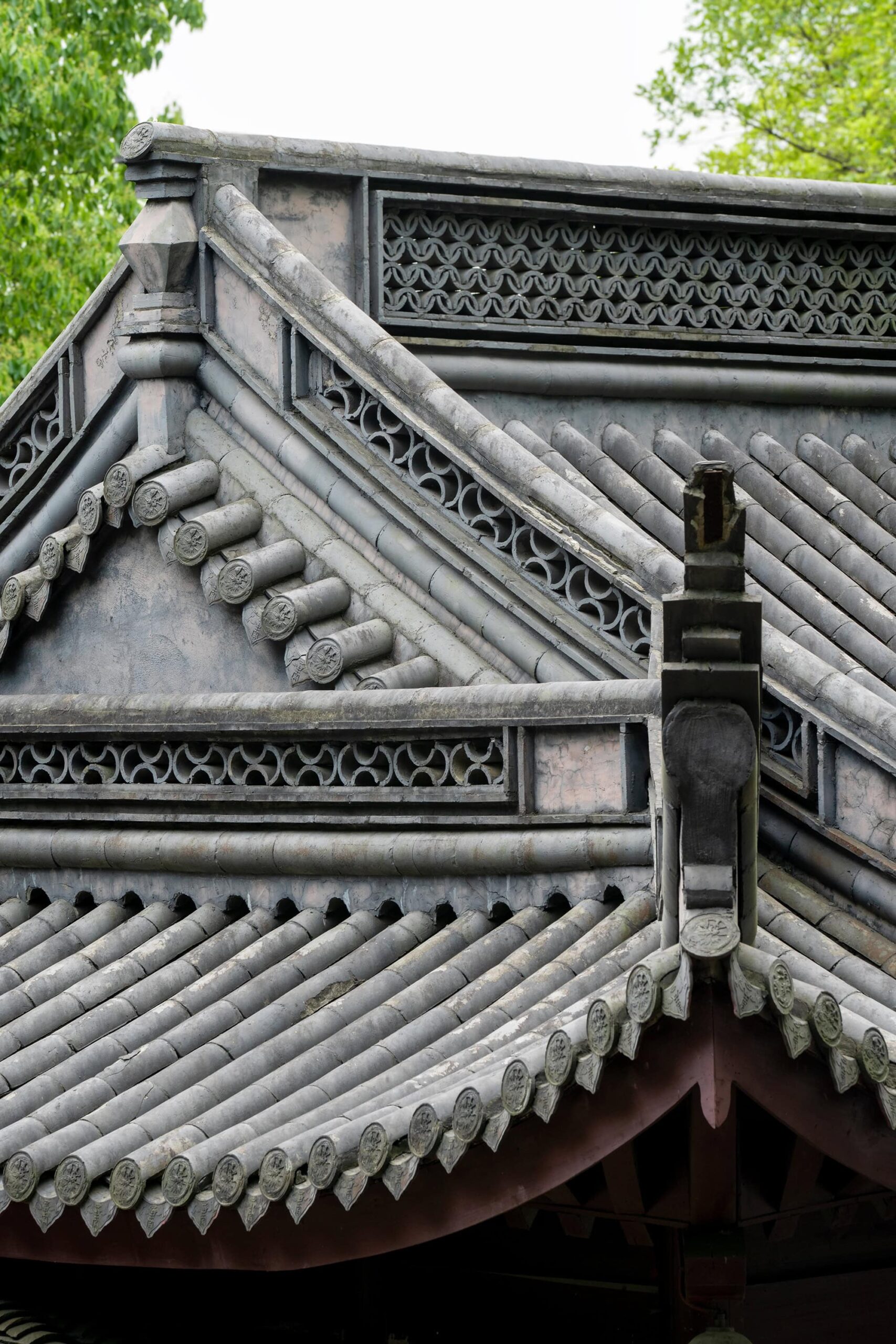 Detailed view of the eaves on a mid-mountain building at Baoguo Temple