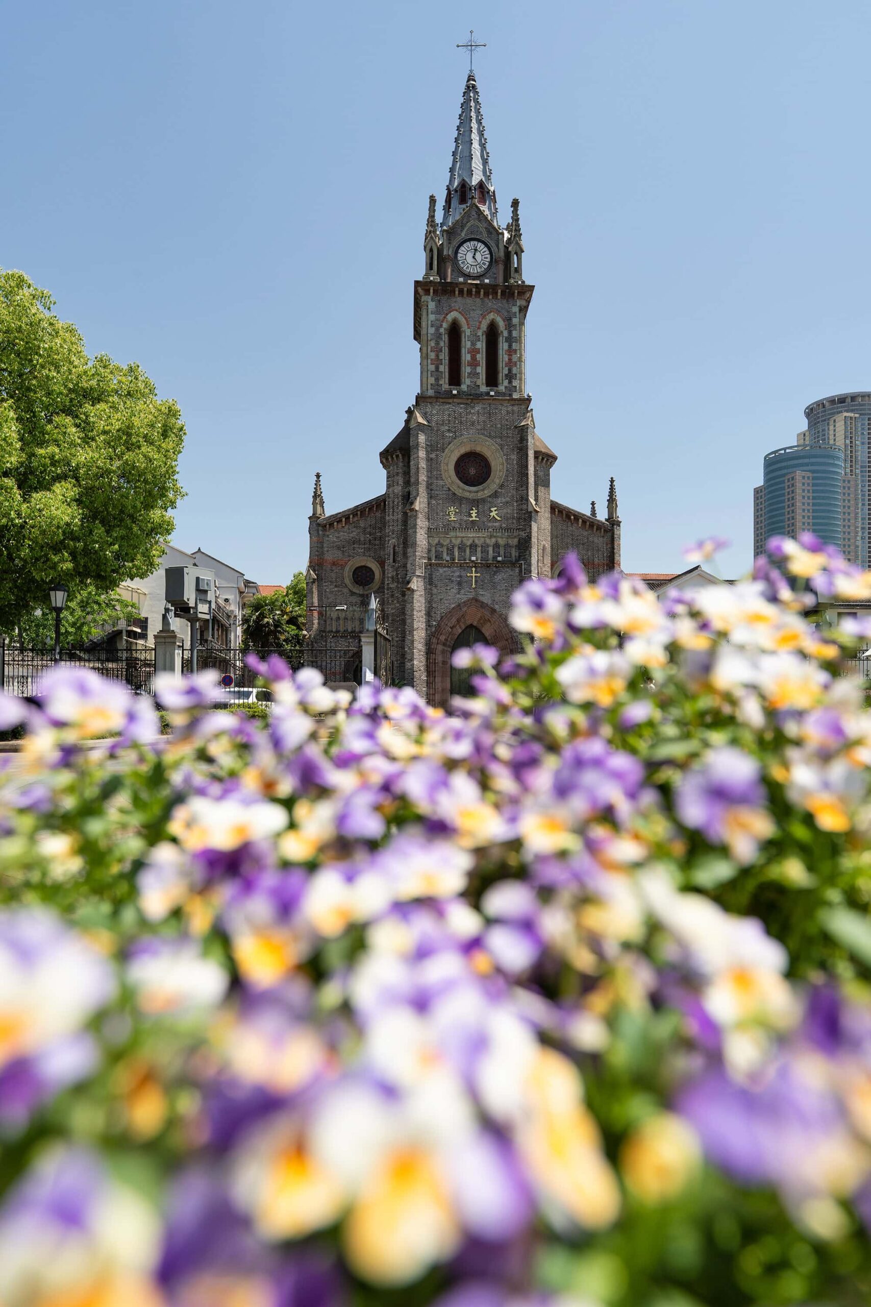 Gothic-style Catholic church near Ningbo Old Bund with distinctive bell tower, a popular stop for Shanghai to Ningbo travelers exploring this historic landmark