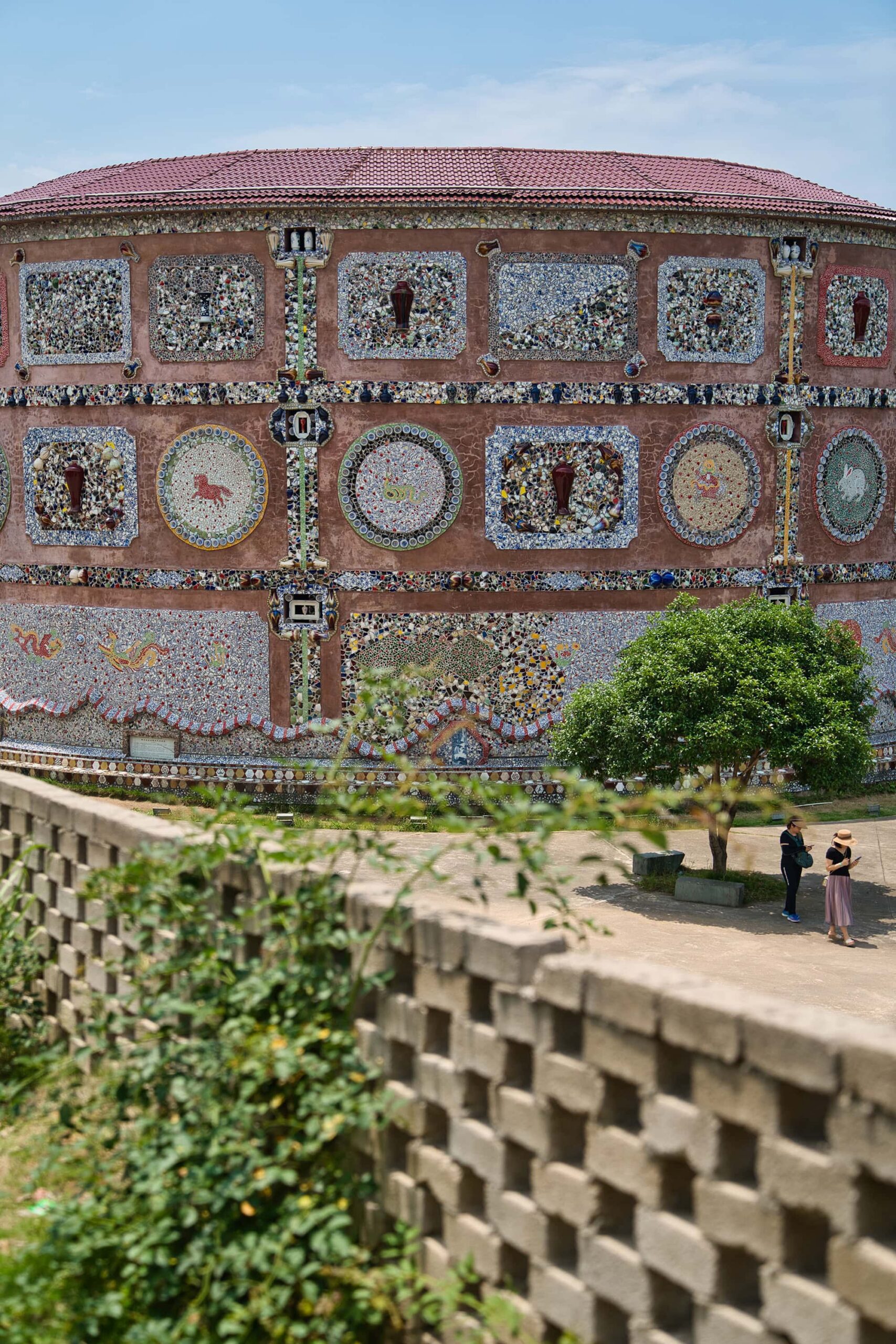 Wide view of the Porcelain Palace in Jingdezhen, China, with detailed exterior ceramic artwork
