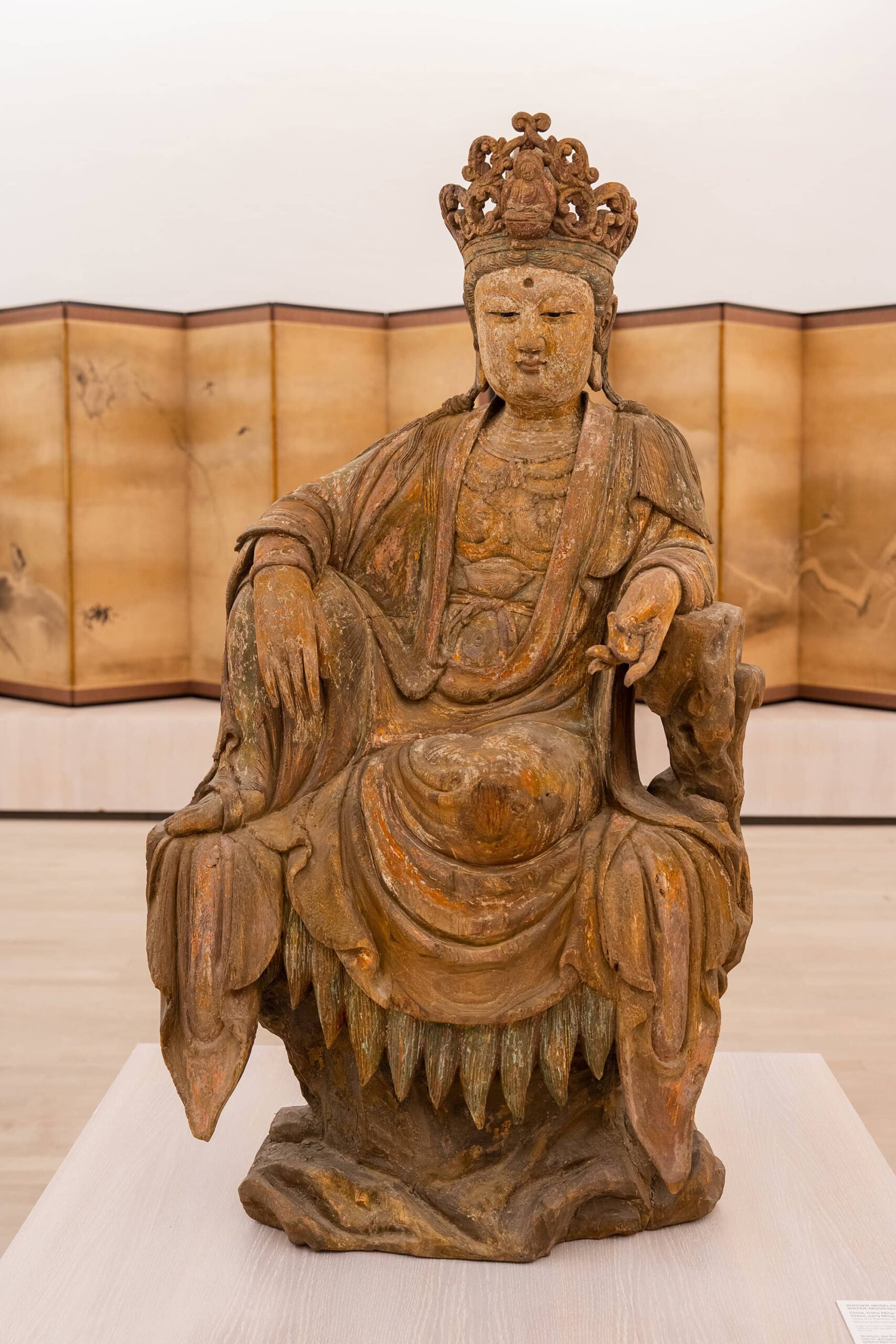 Carved wooden Guanyin statue from the Asian art collection at the Museum für Kunst und Gewerbe Hamburg