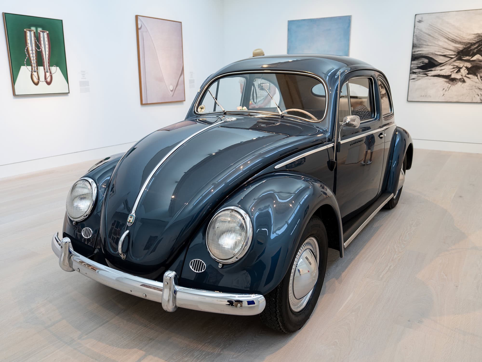Classic blue Volkswagen Beetle displayed in the Museum Kunstpalast