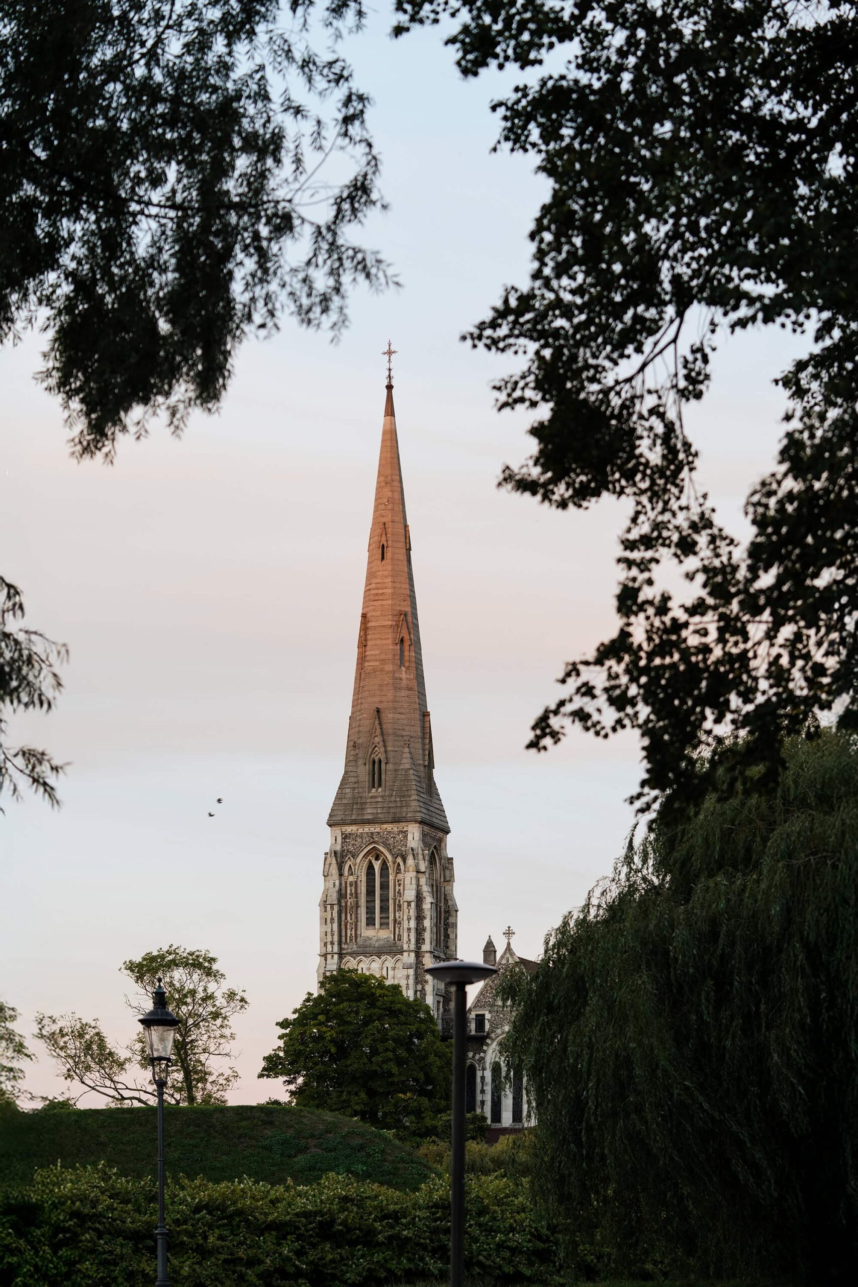 St. Alban’s Church framed by trees inside Kastellet Fortress Copenhagen