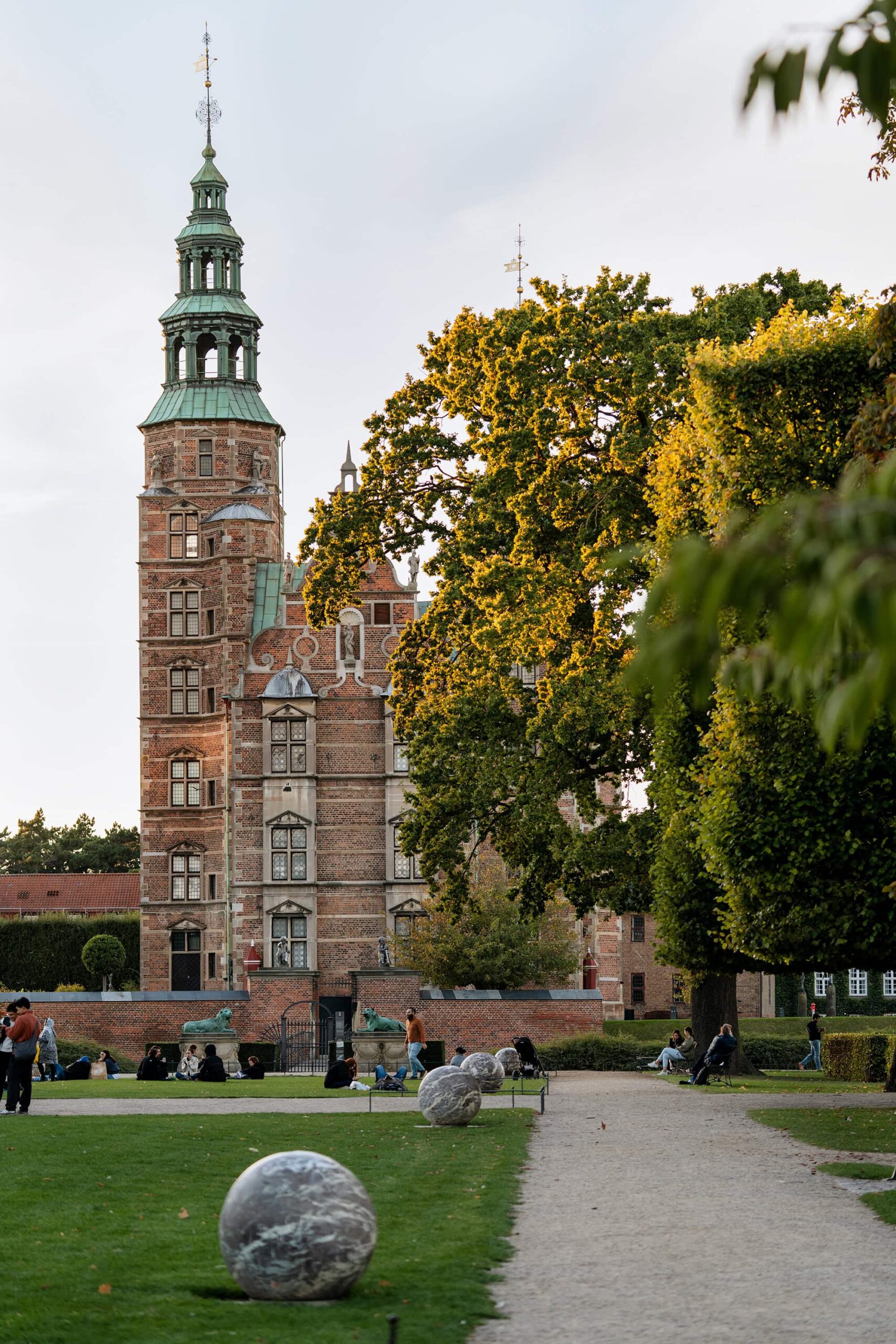 The elegant Rosenborg Castle framed by trees in Copenhagen, a quintessential stop for anyone exploring Copenhagen in a Day