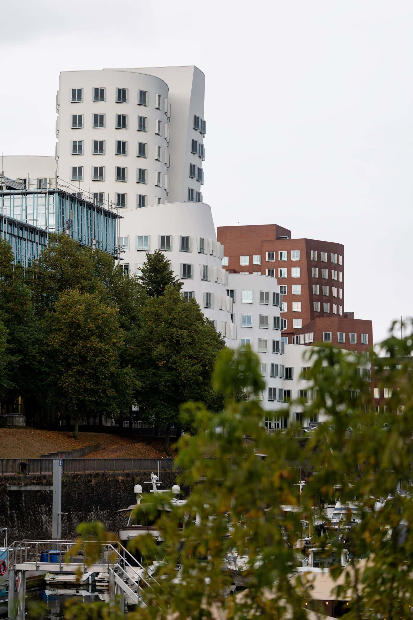 View of the three contrasting towers of Neuer Zollhof in the Media Harbor Düsseldorf showing Frank O. Gehry’s distinctive architecture