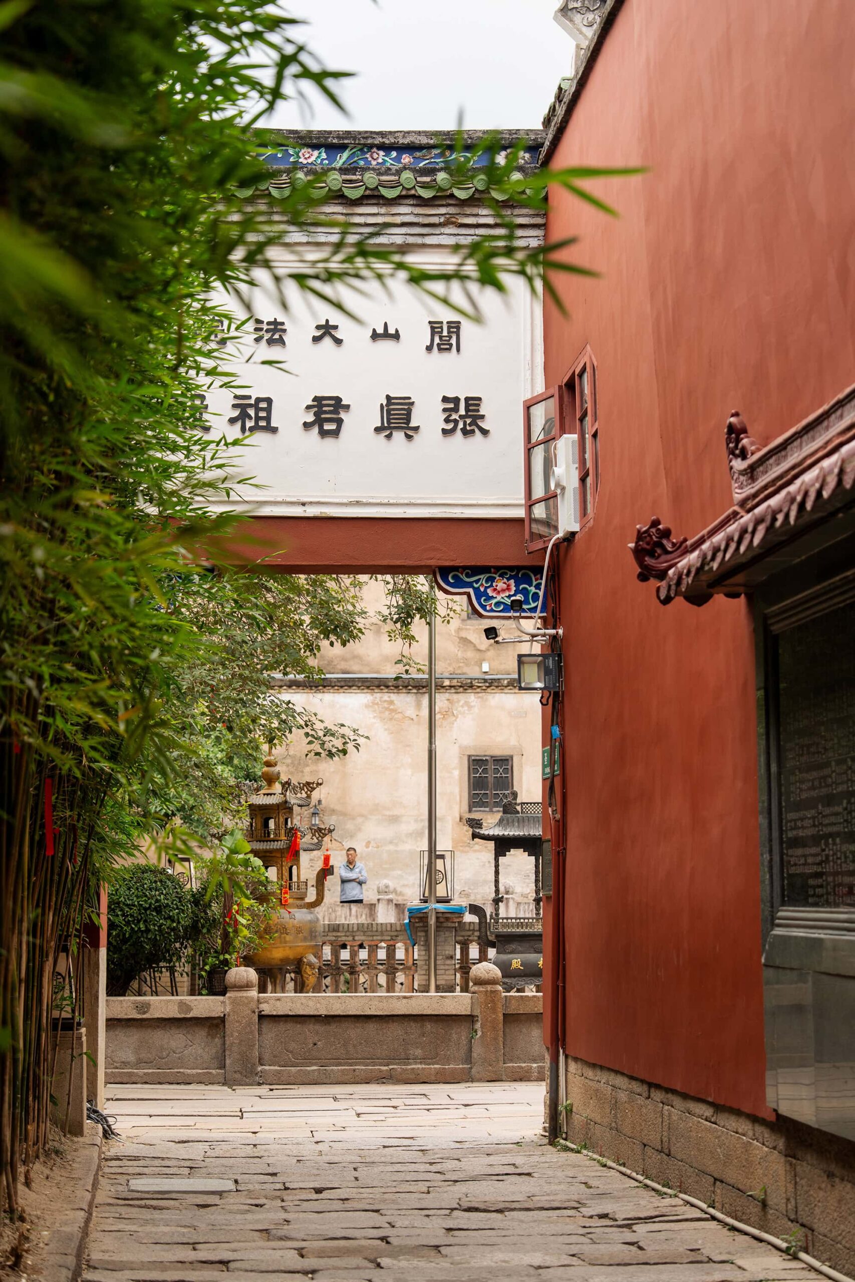 Quiet red-walled passageway in Shang Xia Hang Fuzhou, a vibrant and historic stop in this Fuzhou Travel Guide