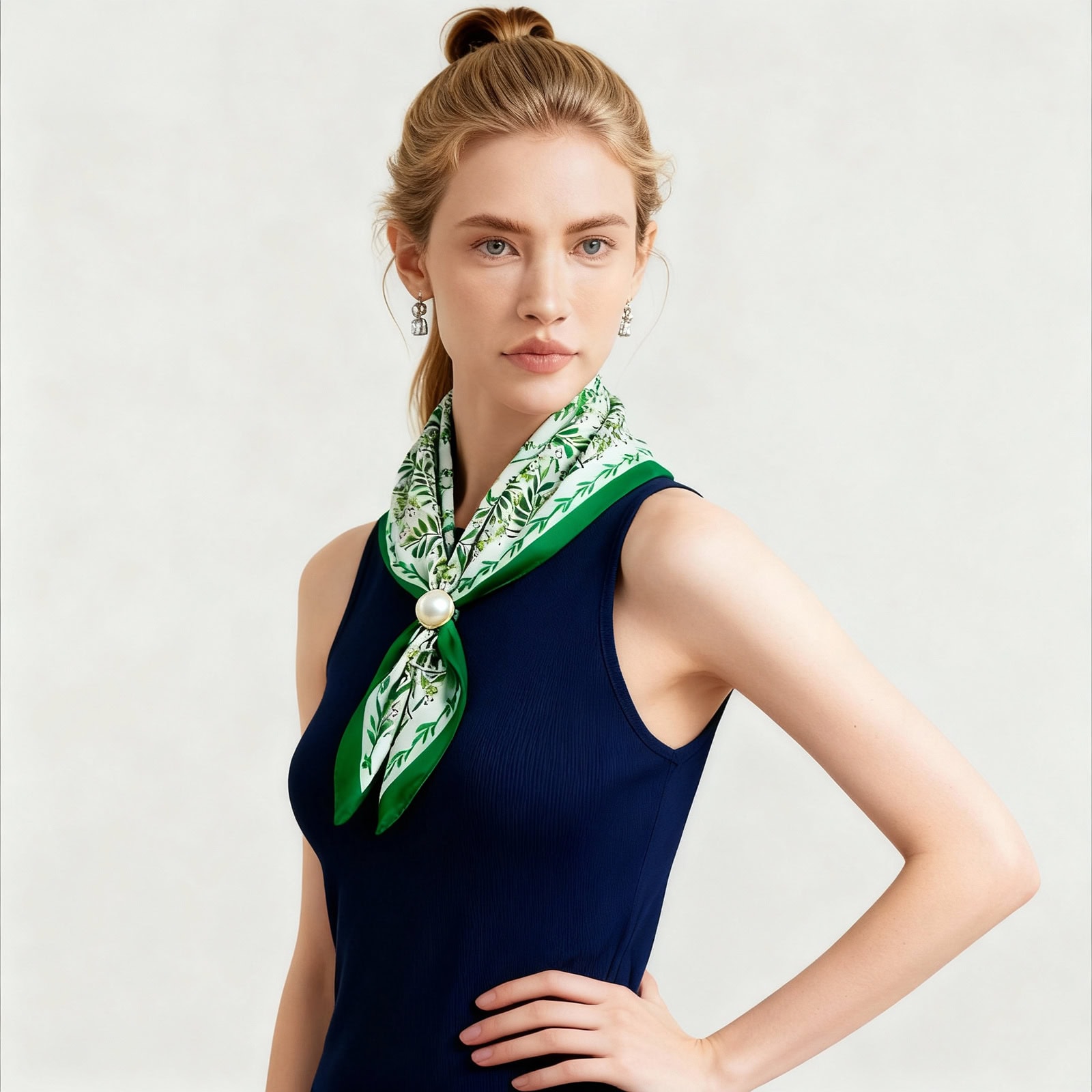 Side view of woman styling Shanghai Story floral silk scarf in mint green