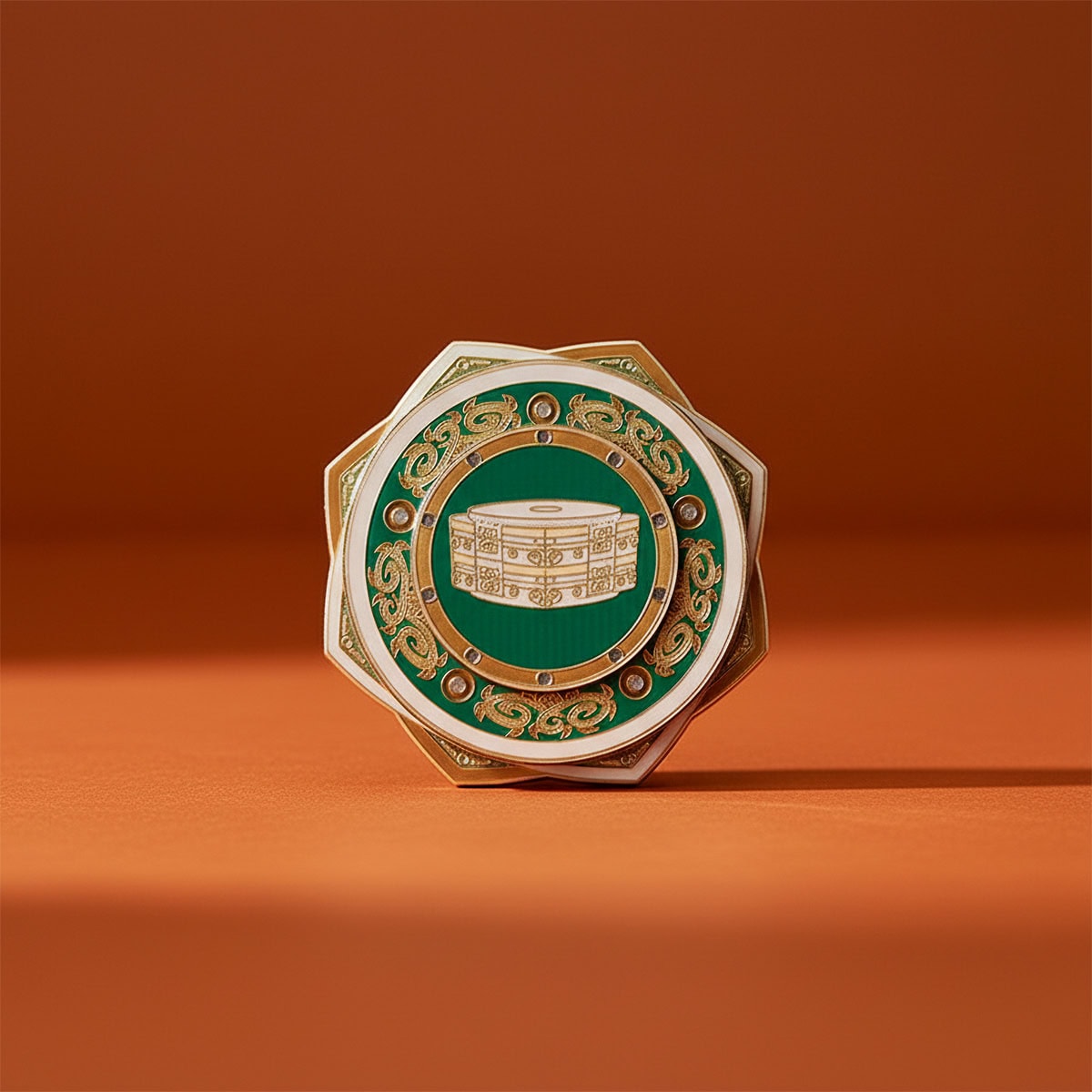 Close-up of the Jade Cong–inspired spinning fridge magnet from the Liangzhu Museum on a clean orange background