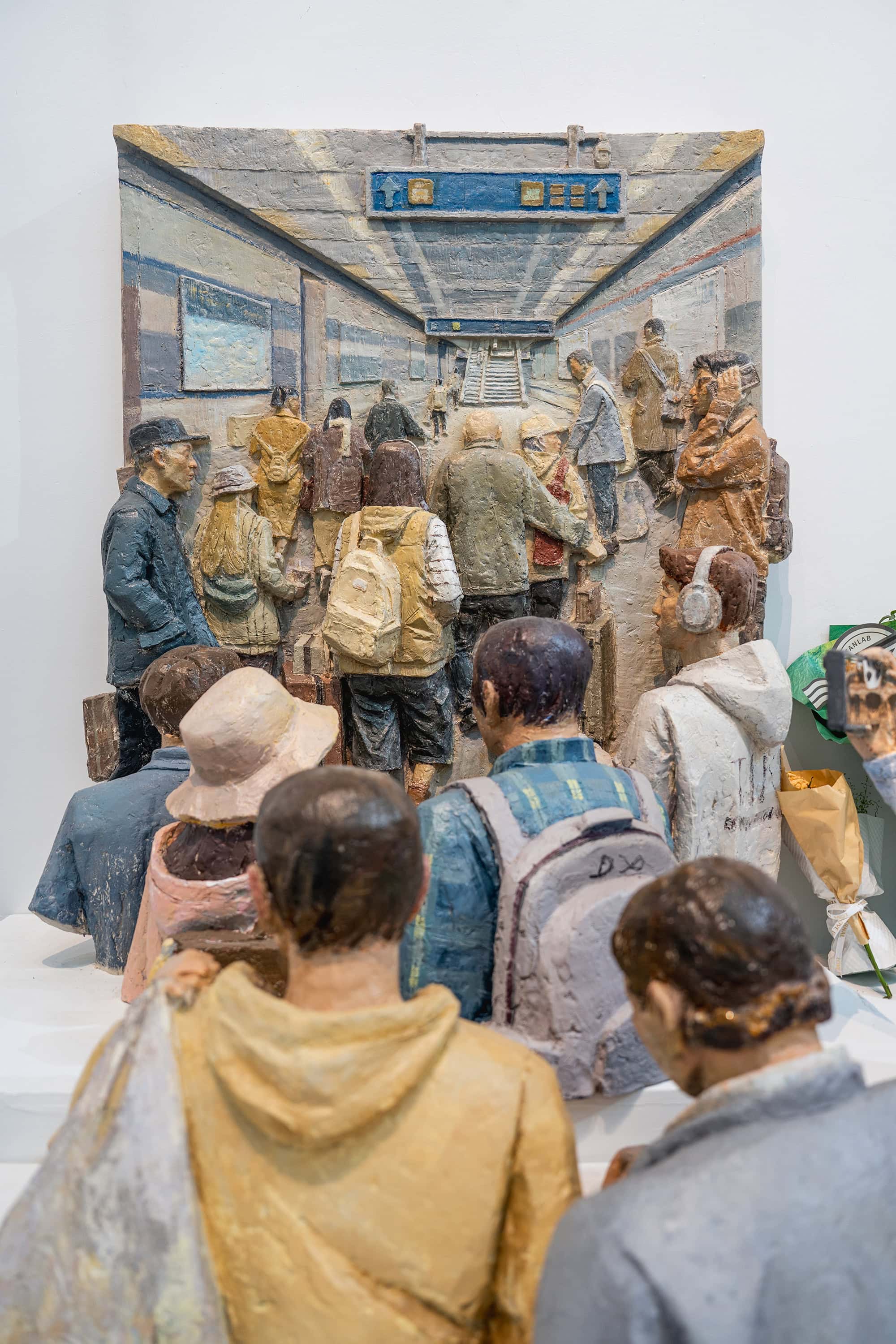 Crowd scene at graduate exhibition