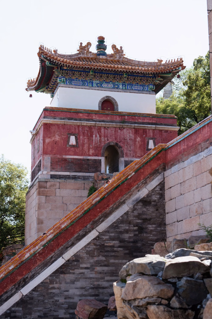 Red pavilion on a stone staircase, one of the Sun and Moon Halls at the Four Great Continents of the Summer Palace in Beijing